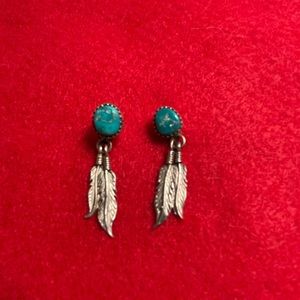 Sterling silver and turquoise earrings with feather detail.